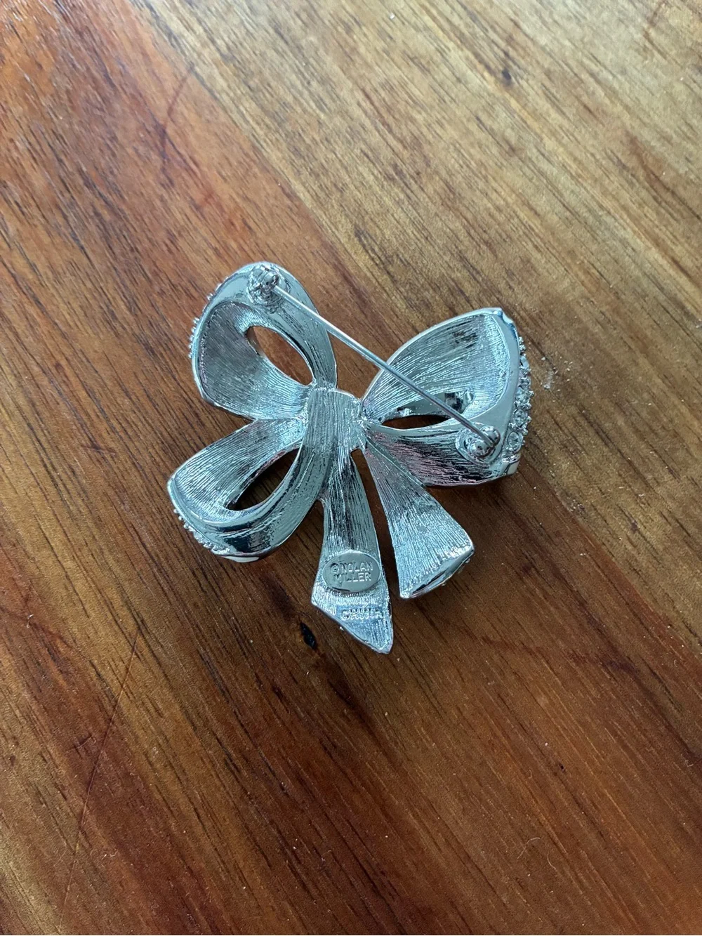 Nolan Miller Shining Spirit Bow Brooch Pin Vintage Silver Tone Rhinestones